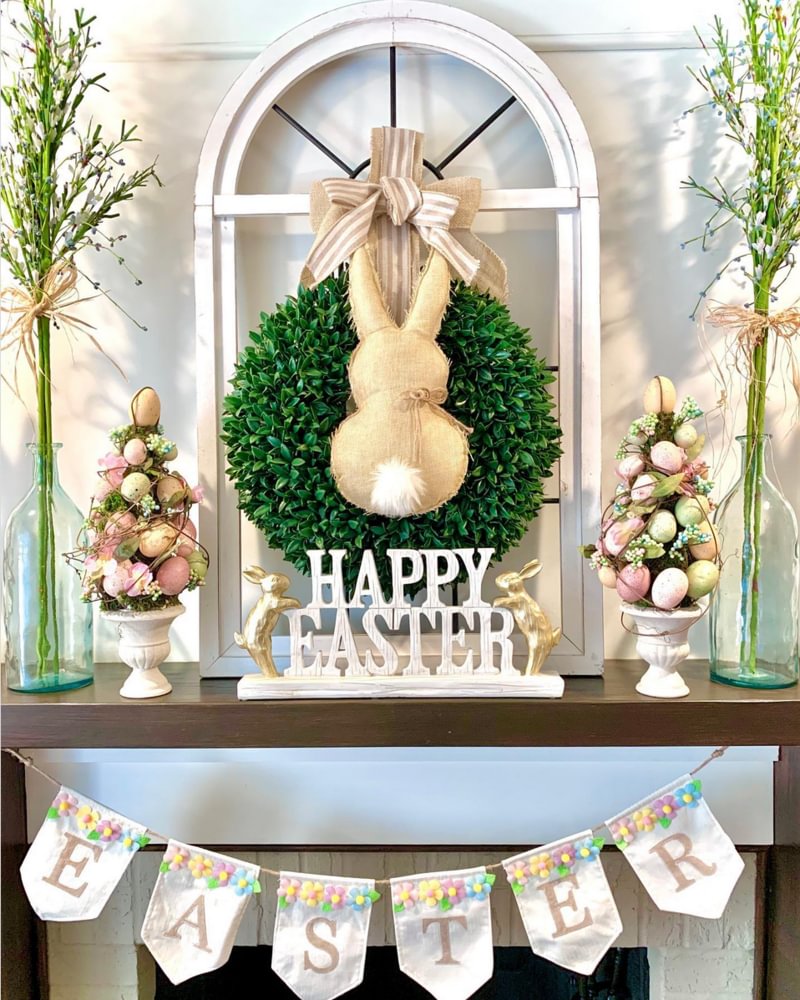 Green easter wreath with bunny in center and happy easter sign