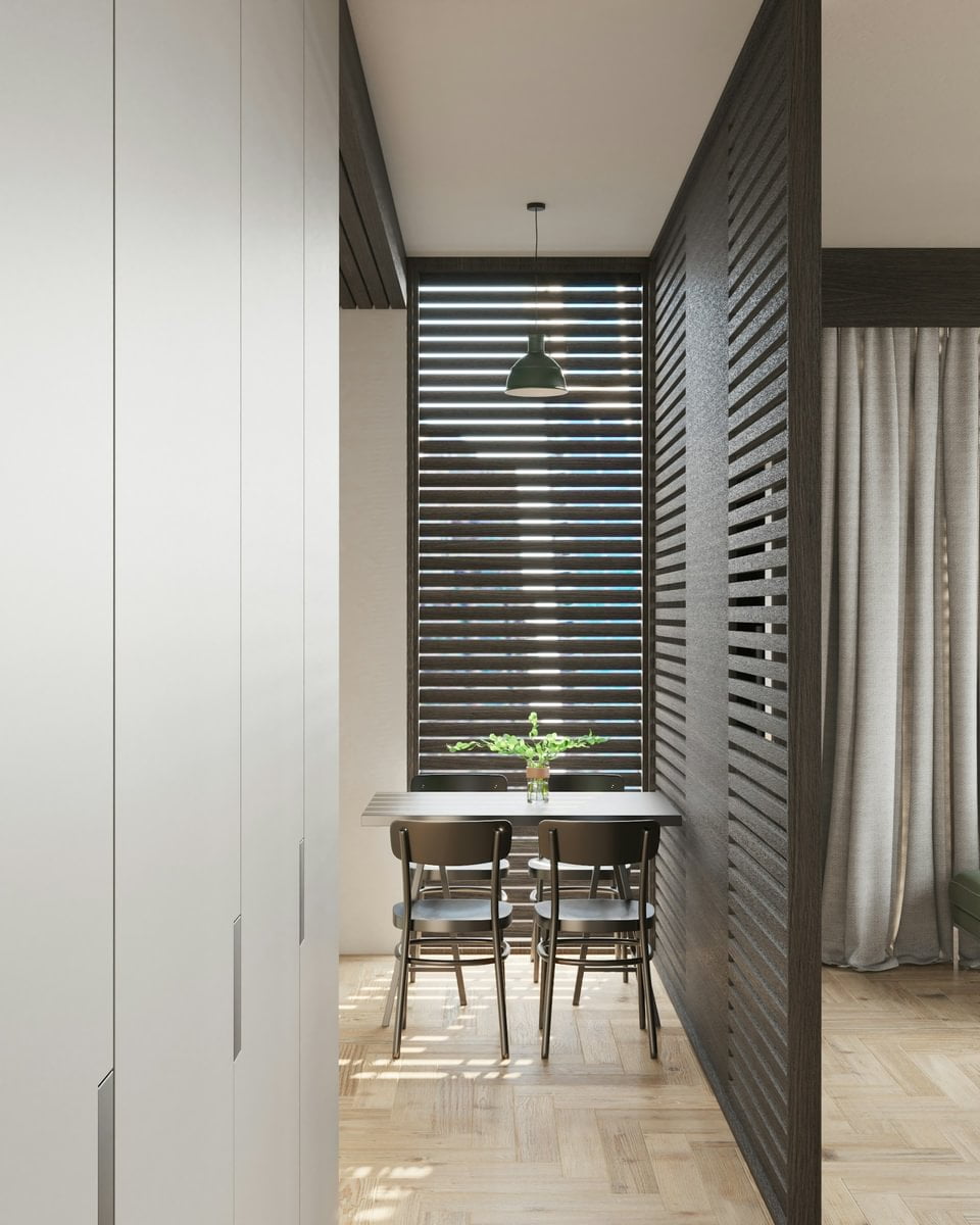 Dining area separated by a black wooden divider