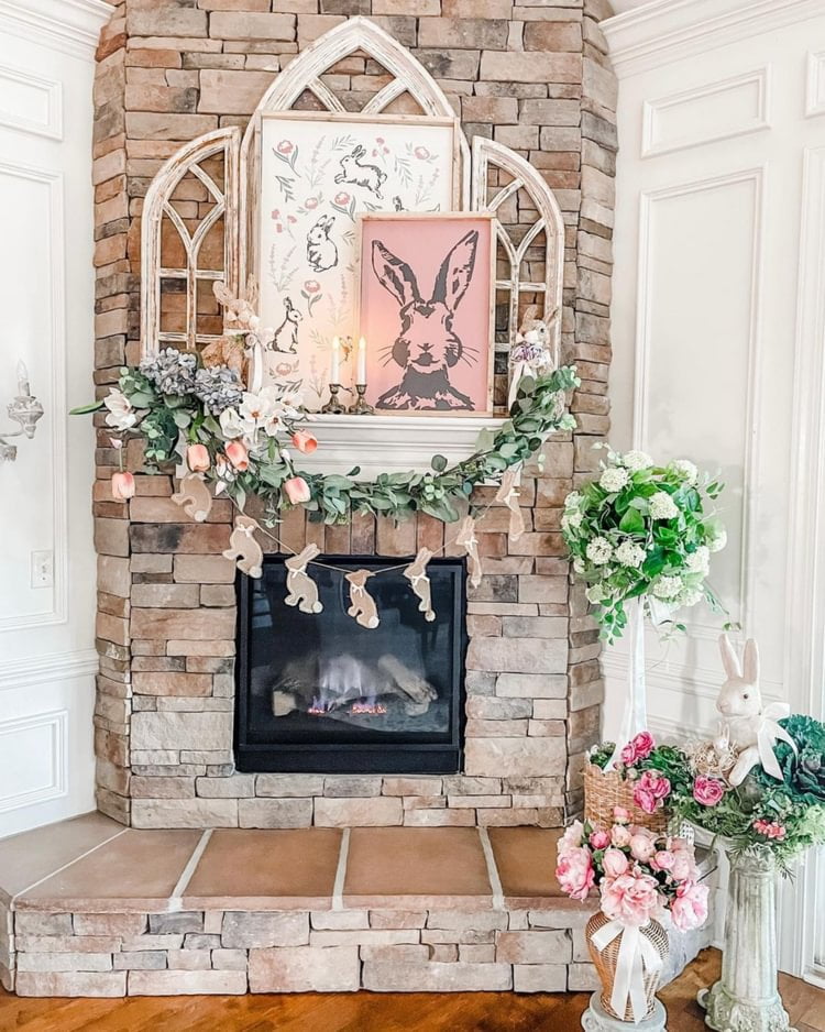 Brick wall with multiple pieces of easter art and bunny garland