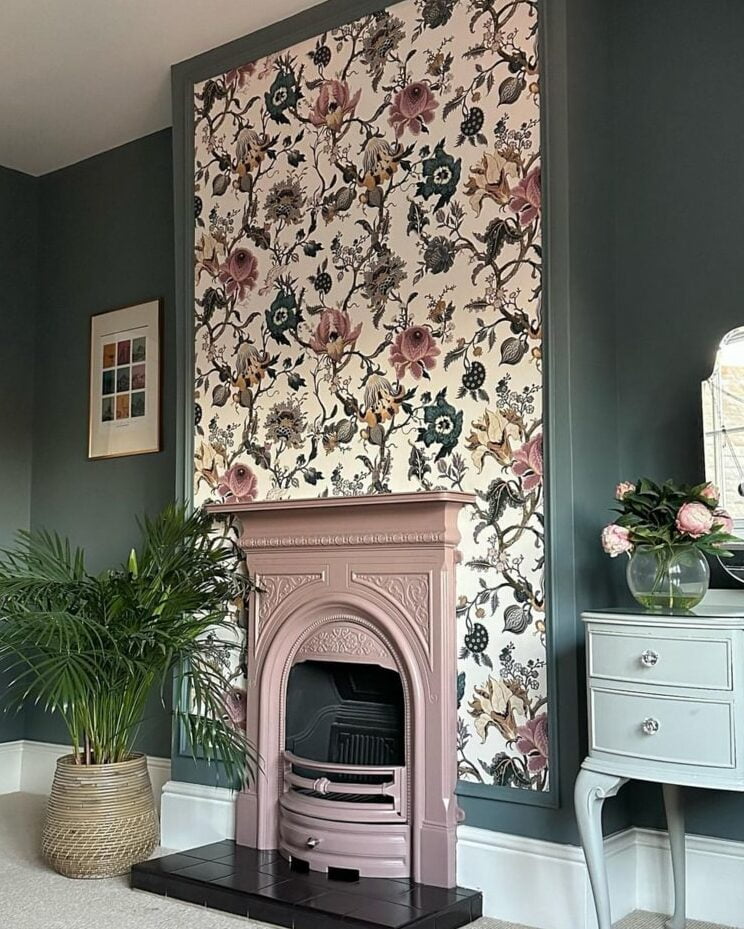Dark green living room alcoves and chimney breast with floral wallpaper